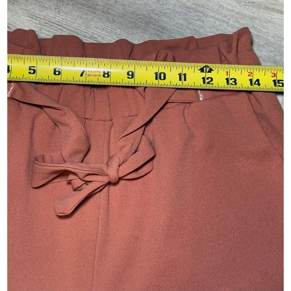 Soho Apperal brownish office pants size large 28 waist 26 length. In great condi